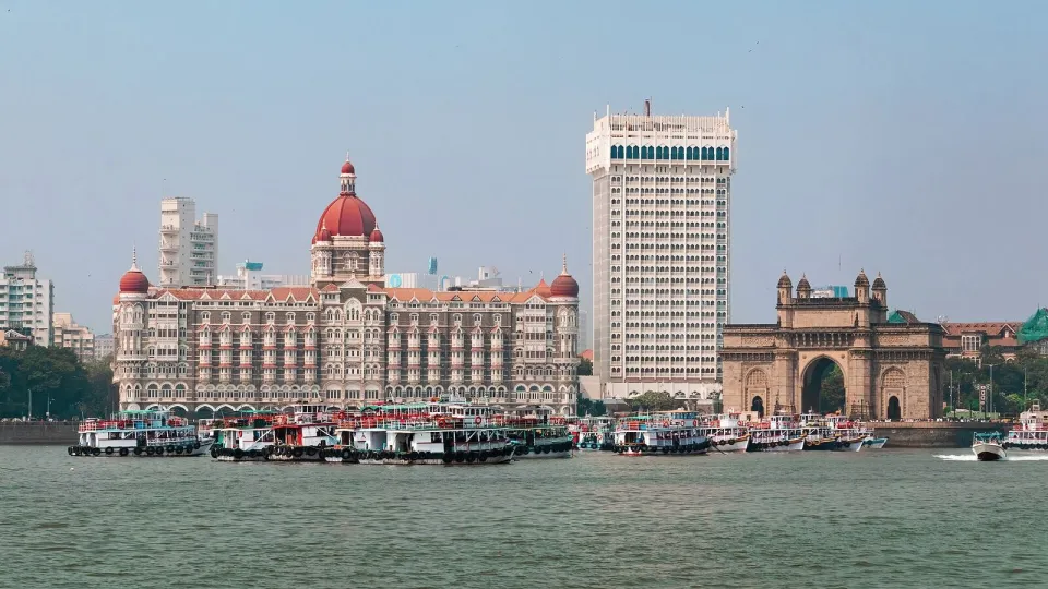 The Taj Mahal Palace hotel and the Gateway of India seen from the harbour in Mumbai