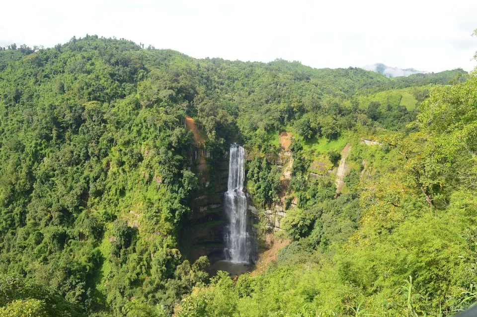 Vantawng Falls dropping through thick green forest in the hills of Mizoram