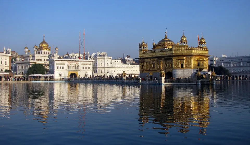 The Golden Temple of Amritsar reflected in its sacred pool